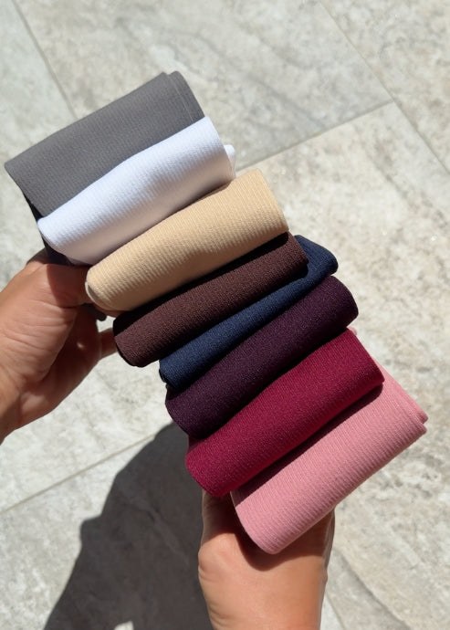 Everstride socks in burgundy packaging