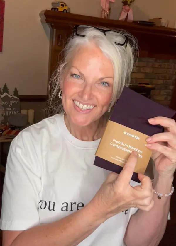 Customer unboxing two pairs of Everstride compression socks at home